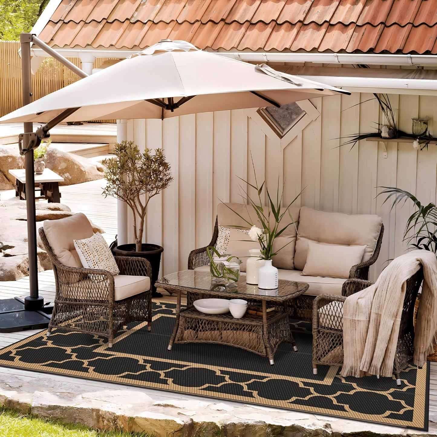 GENIMO Outdoor Rug 9' x 12' Patio Waterproof, Foldable Reversible Plastic Straw Area Rugs Mat for Camper Decor, Outside Carpet for Rv, Deck, Porch, Picnic, Beach, Balcony, Black & Brown